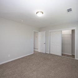 carpet bedroom at One Sovereign Place apartments located in Atlanta, GA
