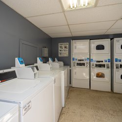 LAUNDRY ROOM at One Sovereign Place apartments located in Atlanta, GA
